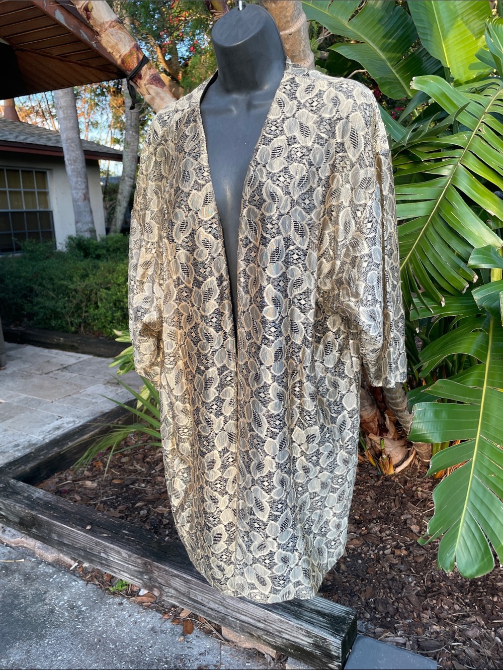 Gold lace, topper, or kimono style jacket